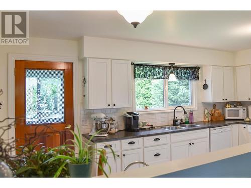 4438 Queensway Drive, Terrace, BC - Indoor Photo Showing Kitchen With Double Sink