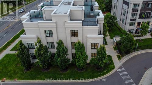 107 - 1180 Cawthra Road, Mississauga, ON - Outdoor With Facade