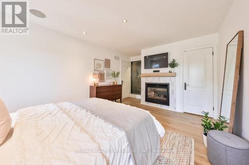 1647 Woodeden Drive, Mississauga, ON - Indoor Photo Showing Bedroom With Fireplace
