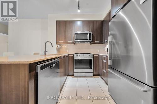 201 - 65 Watergarden Drive N, Mississauga, ON - Indoor Photo Showing Kitchen With Stainless Steel Kitchen With Upgraded Kitchen