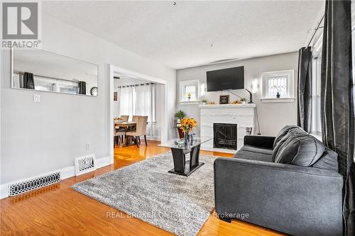 5317 Third Avenue, Niagara Falls, ON - Indoor Photo Showing Living Room With Fireplace