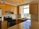 1005 - 9 George Street, Brampton, ON  - Indoor Photo Showing Kitchen With Double Sink 