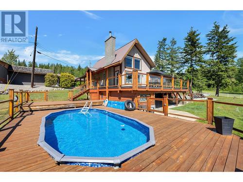 8259 Silver Star Road, Vernon, BC - Outdoor With Above Ground Pool With Deck Patio Veranda