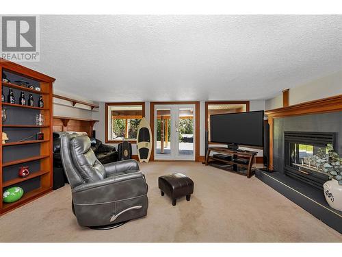 8259 Silver Star Road, Vernon, BC - Indoor Photo Showing Living Room With Fireplace