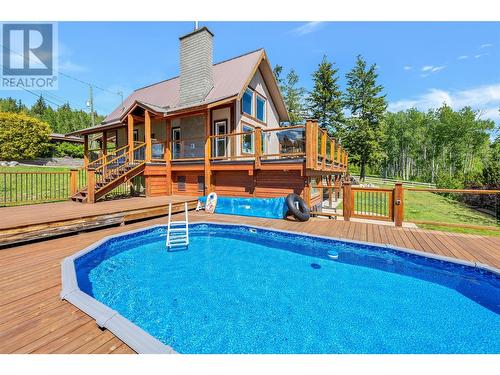 8259 Silver Star Road, Vernon, BC - Outdoor With Above Ground Pool With Deck Patio Veranda With Backyard