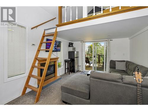 8259 Silver Star Road, Vernon, BC - Indoor Photo Showing Living Room With Fireplace