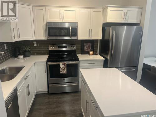 218 545 Hassard Close, Saskatoon, SK - Indoor Photo Showing Kitchen With Stainless Steel Kitchen With Double Sink