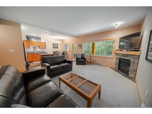 13 - 895 Dogwood Drive, Kimberley, BC - Indoor Photo Showing Living Room With Fireplace