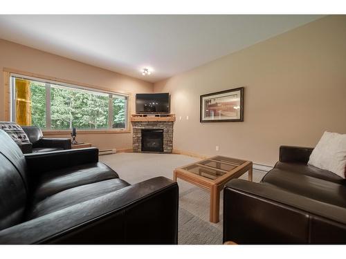 13 - 895 Dogwood Drive, Kimberley, BC - Indoor Photo Showing Living Room With Fireplace