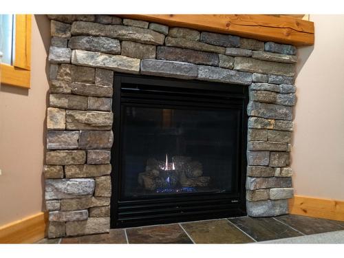 13 - 895 Dogwood Drive, Kimberley, BC - Indoor Photo Showing Living Room With Fireplace