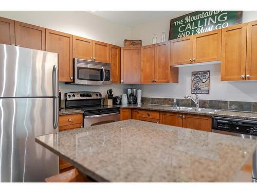 13 - 895 Dogwood Drive, Kimberley, BC - Indoor Photo Showing Kitchen With Stainless Steel Kitchen With Double Sink