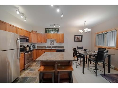 13 - 895 Dogwood Drive, Kimberley, BC - Indoor Photo Showing Kitchen With Stainless Steel Kitchen With Double Sink