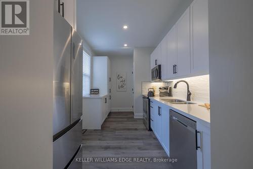 5 Florence Street, Hamilton, ON - Indoor Photo Showing Kitchen With Double Sink