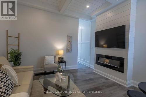 5 Florence Street, Hamilton, ON - Indoor Photo Showing Living Room With Fireplace