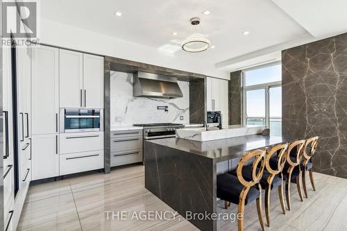 Ph 4104 - 33 Shore Breeze Drive, Toronto, ON - Indoor Photo Showing Kitchen