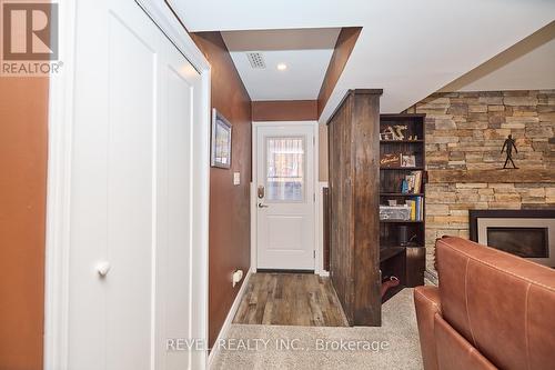 7623 Cavendish Drive, Niagara Falls, ON - Indoor Photo Showing Other Room With Fireplace