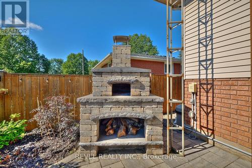 7623 Cavendish Drive, Niagara Falls, ON - Outdoor With Fireplace With Deck Patio Veranda