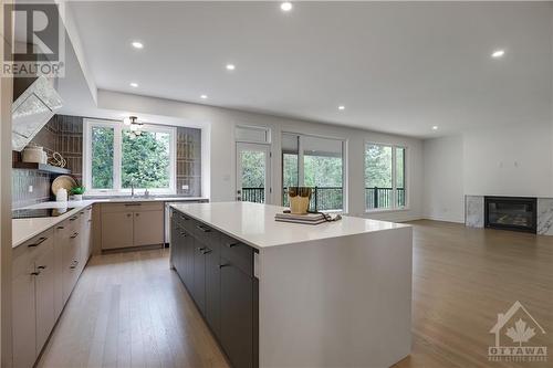 245 Ketchikan Crescent, Ottawa, ON - Indoor Photo Showing Kitchen With Fireplace