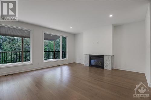 245 Ketchikan Crescent, Ottawa, ON - Indoor Photo Showing Living Room With Fireplace