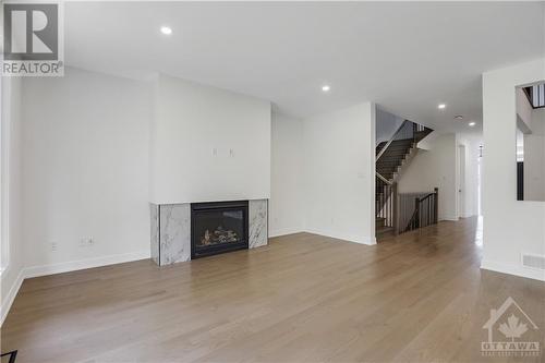 245 Ketchikan Crescent, Ottawa, ON - Indoor Photo Showing Living Room With Fireplace