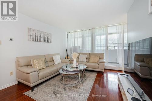 305 - 5580 Sheppard Avenue E, Toronto E11, ON - Indoor Photo Showing Living Room