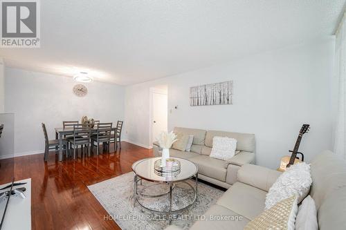 305 - 5580 Sheppard Avenue E, Toronto E11, ON - Indoor Photo Showing Living Room
