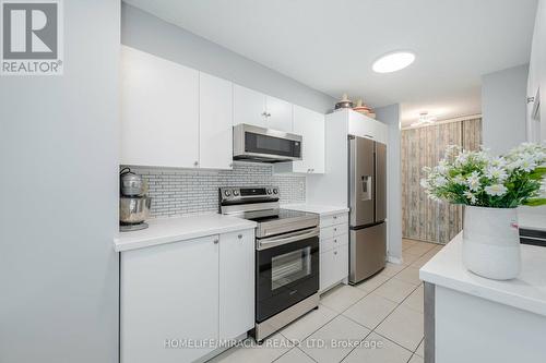 305 - 5580 Sheppard Avenue E, Toronto E11, ON - Indoor Photo Showing Kitchen