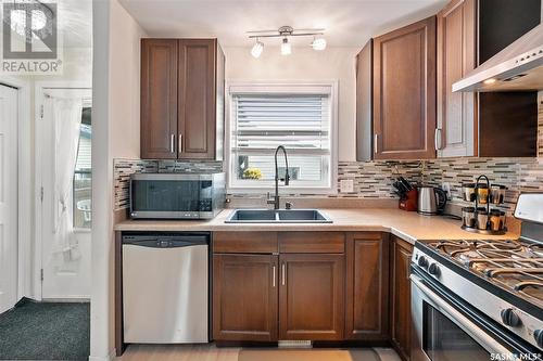 731 Lamarsh Lane, Saskatoon, SK - Indoor Photo Showing Kitchen With Stainless Steel Kitchen With Double Sink