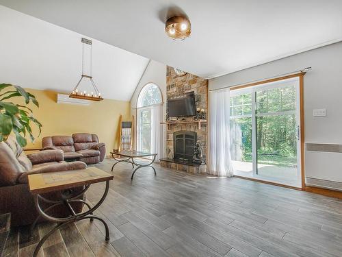 Salon - 14 Rue Charles-Rodrigue, Gore, QC - Indoor Photo Showing Living Room With Fireplace