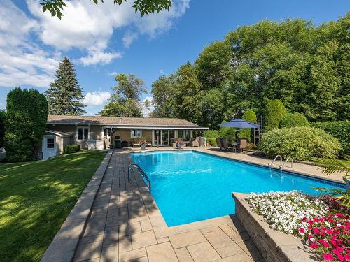 Backyard - 1593 Boul. Perrot, Notre-Dame-De-L'Île-Perrot, QC - Outdoor With In Ground Pool