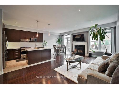 64 Andretti Cres, Brampton, ON - Indoor With Fireplace