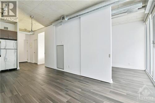 LIVING SPACE | privacy sliding door to bedroom - 354 Gladstone Avenue Unit#502, Ottawa, ON 