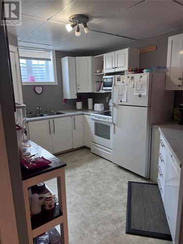 17 Tully Place, Gander, NL - Indoor Photo Showing Kitchen With Double Sink