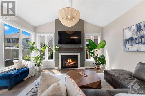 262 Shinleaf Crescent, Ottawa, ON - Indoor Photo Showing Living Room With Fireplace