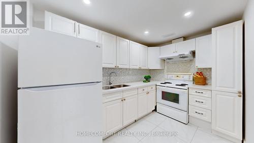 208 Cass Avenue, Toronto E05, ON - Indoor Photo Showing Kitchen With Double Sink