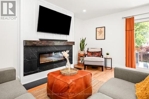 131 Rodgers Road, Hamilton, ON - Indoor Photo Showing Living Room With Fireplace