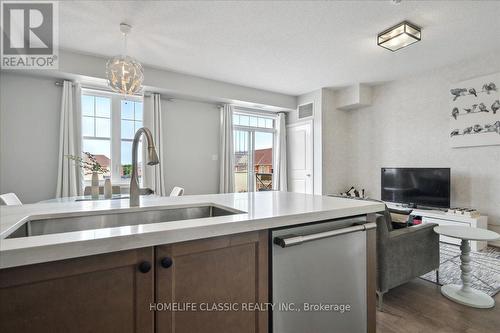 301 - 2339 Sawgrass Drive, Oakville, ON - Indoor Photo Showing Kitchen With Double Sink