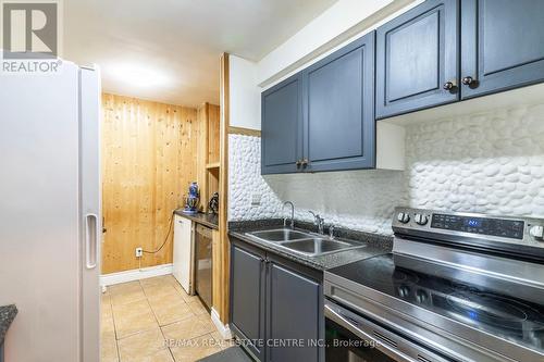 124 - 2095 Roche Court, Mississauga (Sheridan), ON - Indoor Photo Showing Kitchen With Double Sink With Upgraded Kitchen