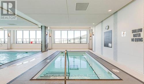 917 - 30 Shore Breeze Drive, Toronto (Mimico), ON - Indoor Photo Showing Other Room With In Ground Pool