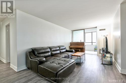 Ph26 - 75 Bamburgh Circle, Toronto, ON - Indoor Photo Showing Living Room