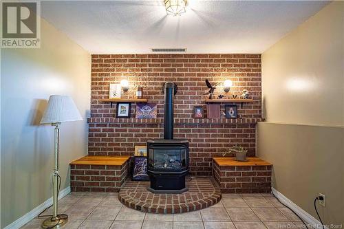 161 French Village Road, Kingsclear, NB - Indoor Photo Showing Other Room With Fireplace