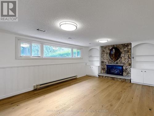 23 Ambrose Road, Toronto, ON - Indoor Photo Showing Living Room With Fireplace