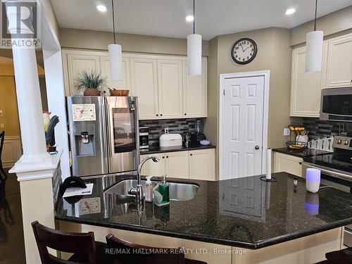 63 Buxton Lane, Clarington (Bowmanville), ON - Indoor Photo Showing Kitchen With Double Sink