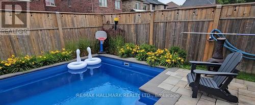 63 Buxton Lane, Clarington (Bowmanville), ON - Outdoor With In Ground Pool With Deck Patio Veranda With Exterior