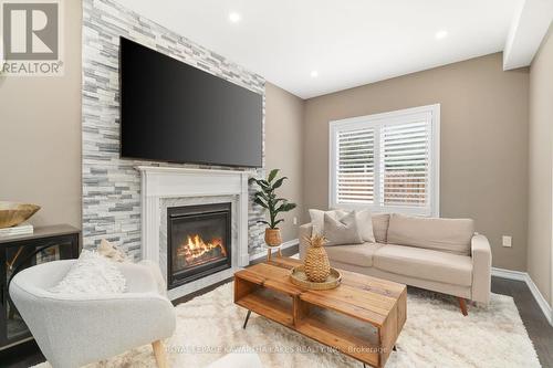 52 Claxton Crescent, Kawartha Lakes, ON - Indoor Photo Showing Living Room With Fireplace