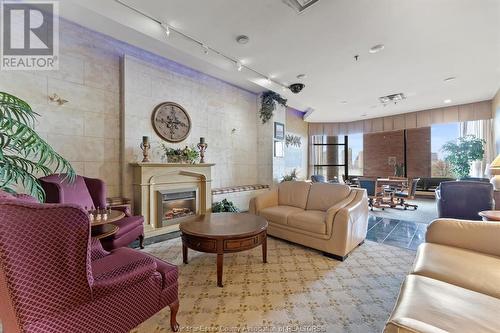 515 Riverside Drive West Unit# 1607, Windsor, ON - Indoor Photo Showing Living Room With Fireplace