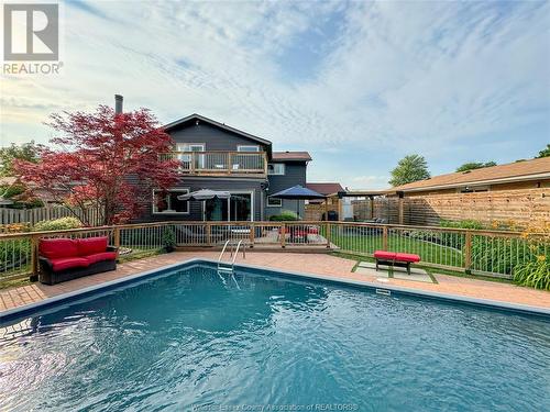 8235 Riverside Drive East, Windsor, ON - Outdoor With In Ground Pool With Balcony