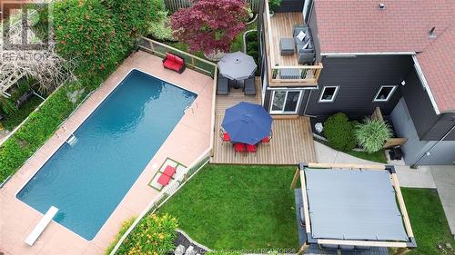 8235 Riverside Drive East, Windsor, ON - Outdoor With In Ground Pool