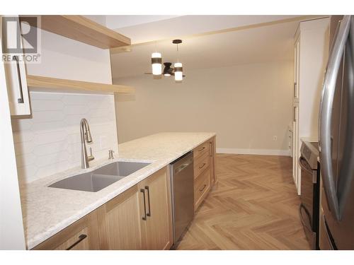 217 Elm Avenue Unit# 109, Penticton, BC - Indoor Photo Showing Kitchen With Double Sink