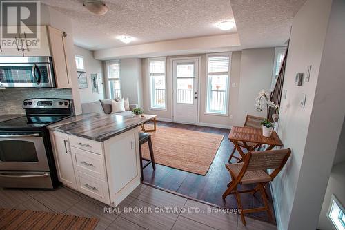 B - 489 East Avenue, Kitchener, ON - Indoor Photo Showing Kitchen